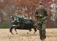 Latest In Defence - QEC floated out; US Marines LS3 robot; DARPA Exacto guided bullet