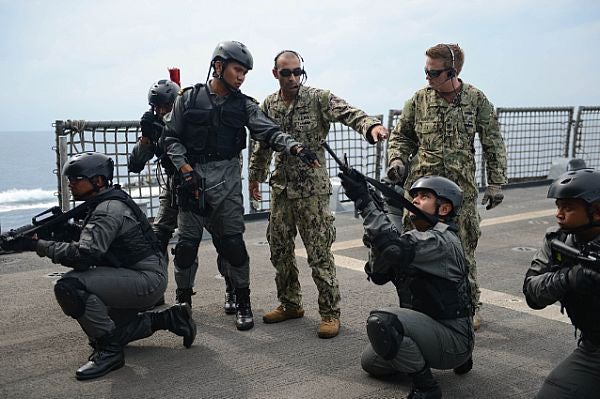 Sailors from the Maritime Civil Affairs and Security Training (MCAST) team